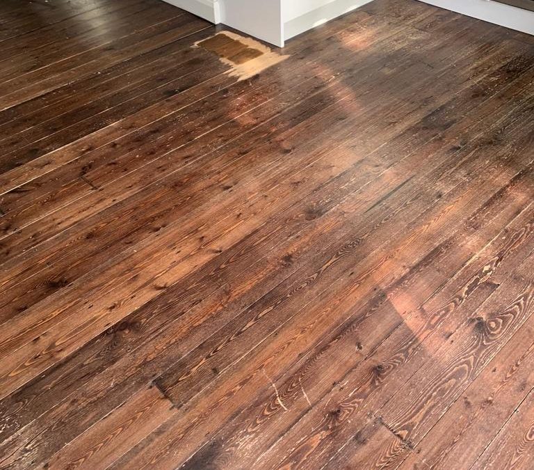 Pine floor boards with stained dark oak